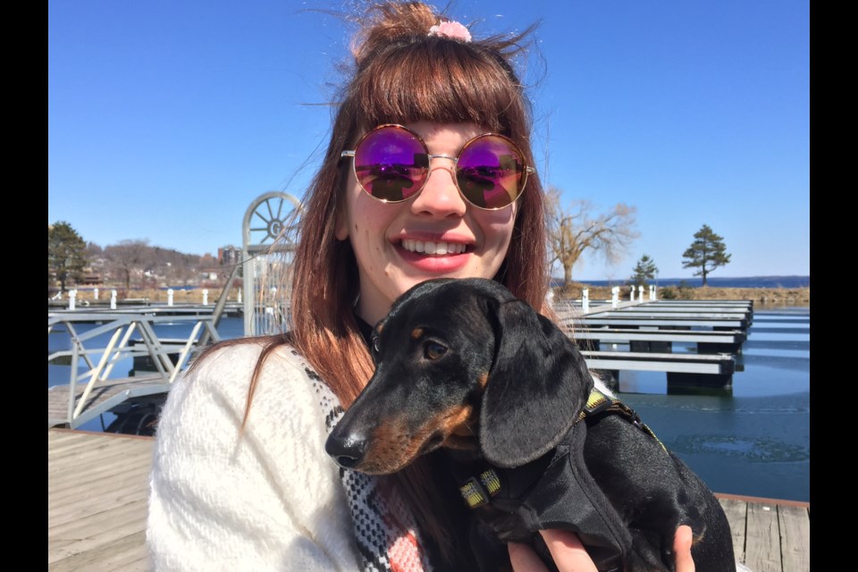 Kayla Hill and her miniature dachshund Walter were enjoying the sunshine.  Sue Sgambati/BarrieToday