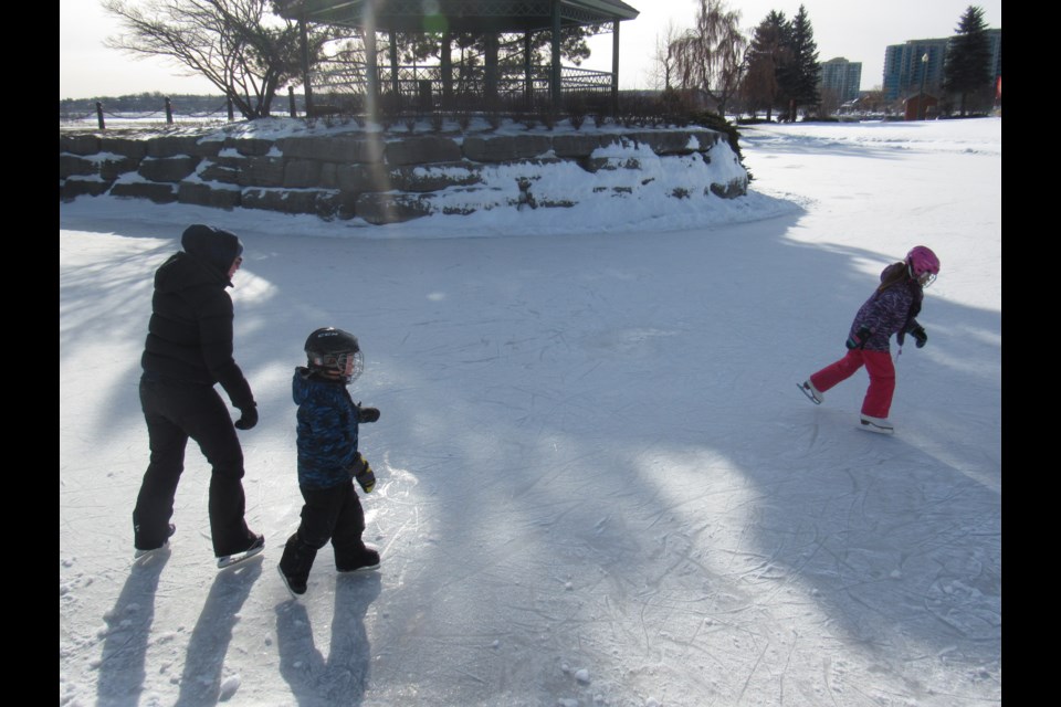 Stephanie Banting and her children skate the new frozen pond at Heritage Park. Shawn Gibson/BarrieToday                               