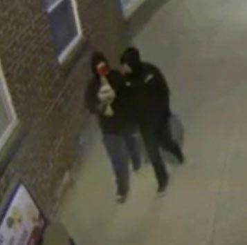 A security camera catches two suspects that police are interested in speaking with. Photo from Barrie Police Twitter