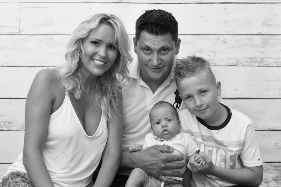 Jan Platil, centre, with his wife Michaela, eldest son Samuel and newborn son Damien, in a recent photo. Photo supplied