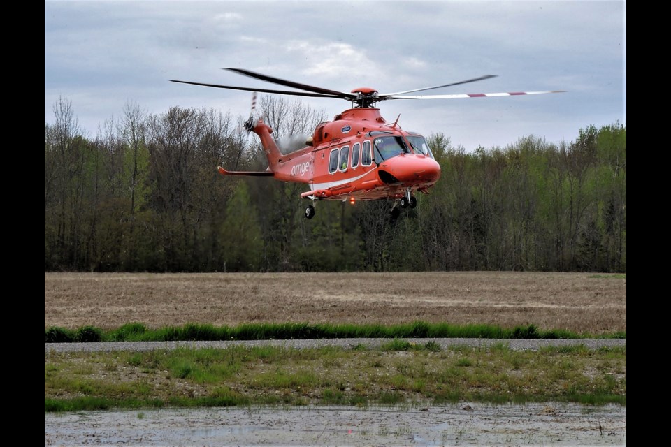 An air ambulance lands in Innisfil following a head-on collision involving two vehicles around 10:30 a.m. on May 22, 2019. Photo supplied