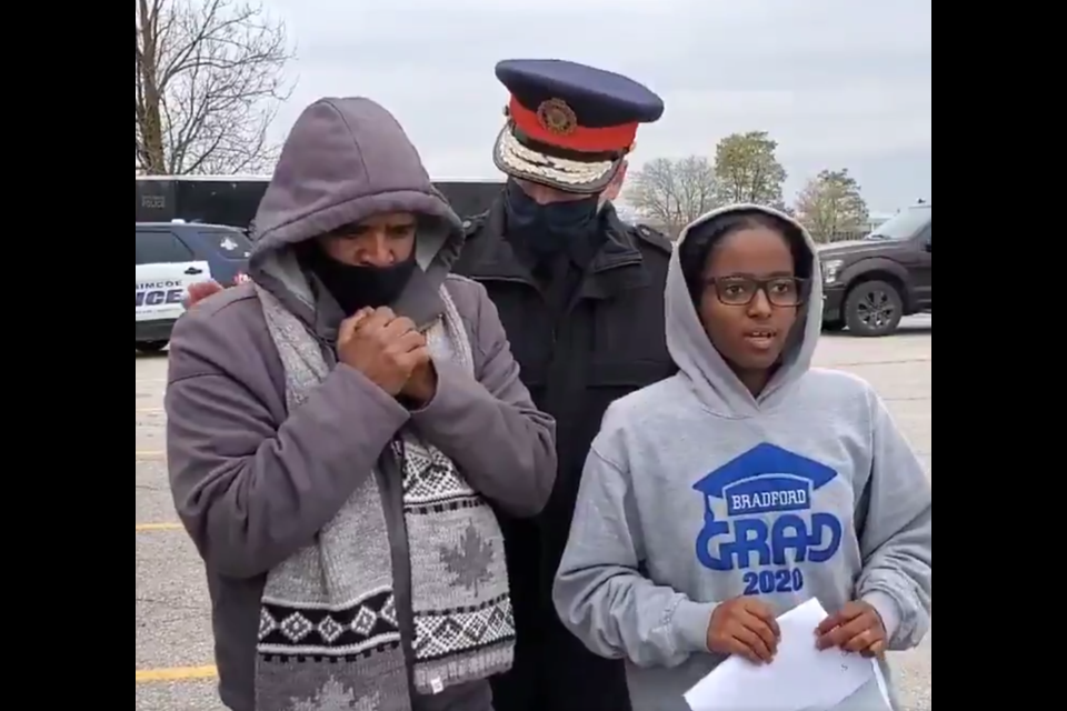 Siem Zerezghi's father and sister make a plea for his safe return on Thursday. With them is South Simcoe Police Chief Andrew Fletcher. Screenshot