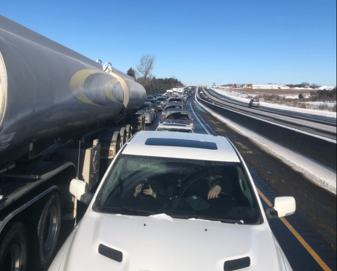 A person stuck on Highway 400 on Sunday snaps a pitcure after a multi-vehicle collision caused a backup of traffic in the southbound lanes.