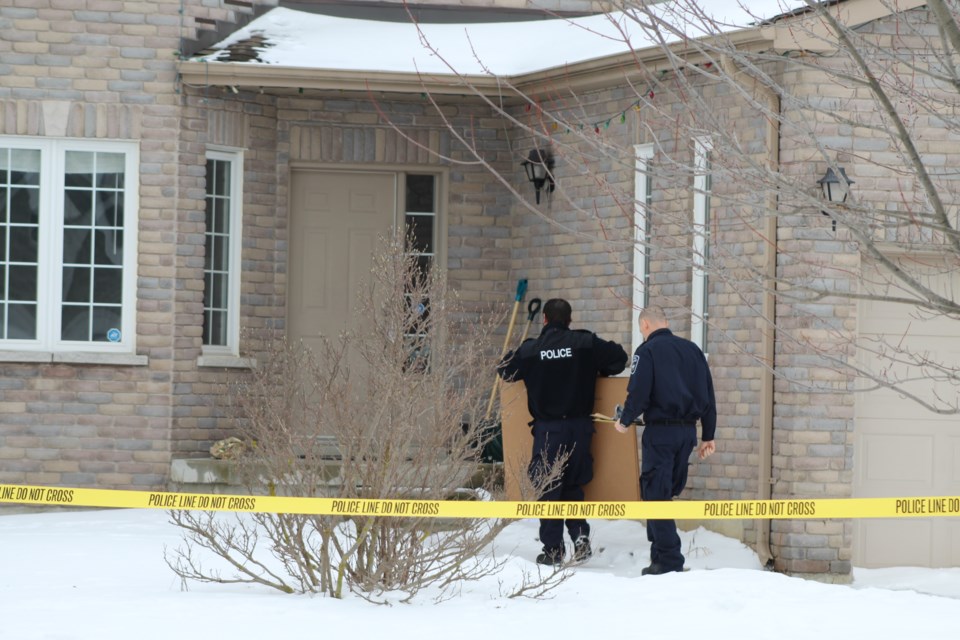 Barrie police forensic identification officers prepare to enter a home at 17 Penvill Trail in the city's south end in February 2019. | Raymond Bowe/BarrieToday