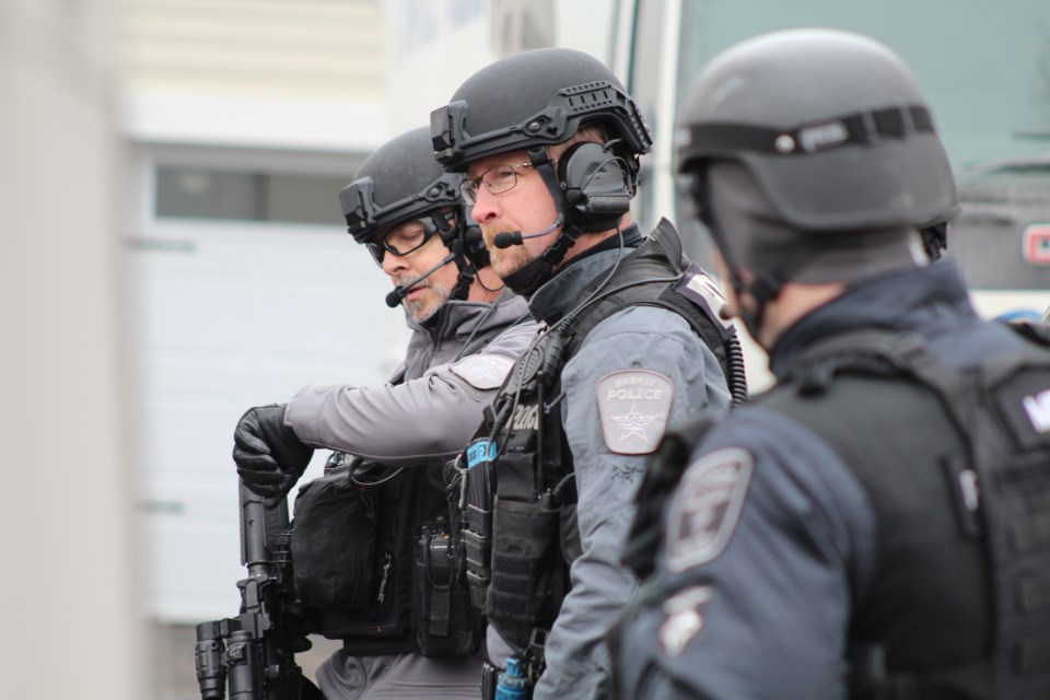 Barrie police tactical officers listen to instructions during training on Wednesday, March 13, 2019 at a home on Crawford Street. Raymond Bowe/BarrieToday