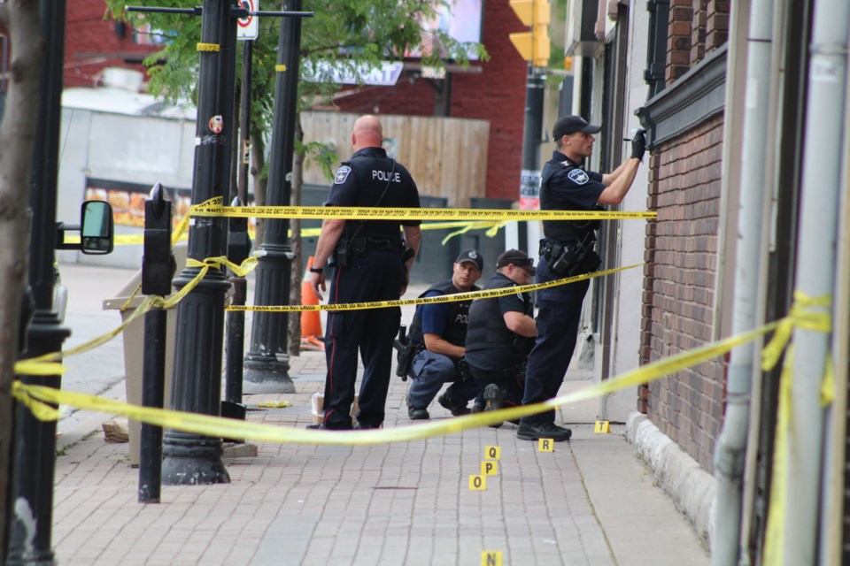 City police officers investigate a stabbing in downtown Barrie on Saturday, July 27, 2019. Raymond Bowe/BarrieToday