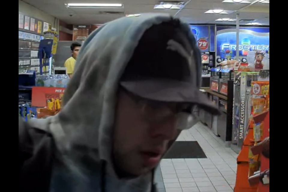 Barrie police have released two photos of a suspect wanted in connection to a stolen credit card. Image supplied