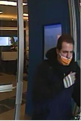 Surveillance photo shows suspect in Monday morning robbery of the Bank of Montreal on Collier Street in Barrie. Photo supplied