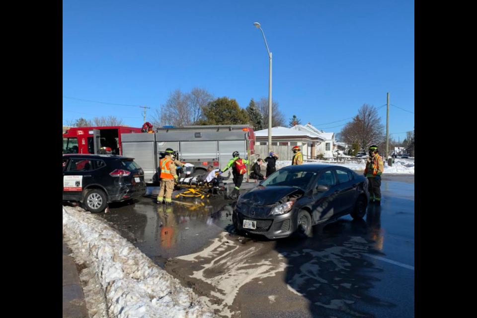 Emergency crews tend to the injured following a crash at the corner of Wellington and Donald streets in Barrie on Dec. 2, 2020. Raymond Bowe/BarrieToday
