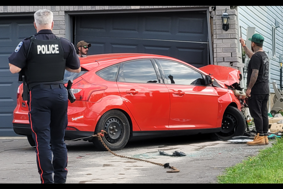 Police investigate a Sunday morning crash on St. Vincent Street in Barrie.