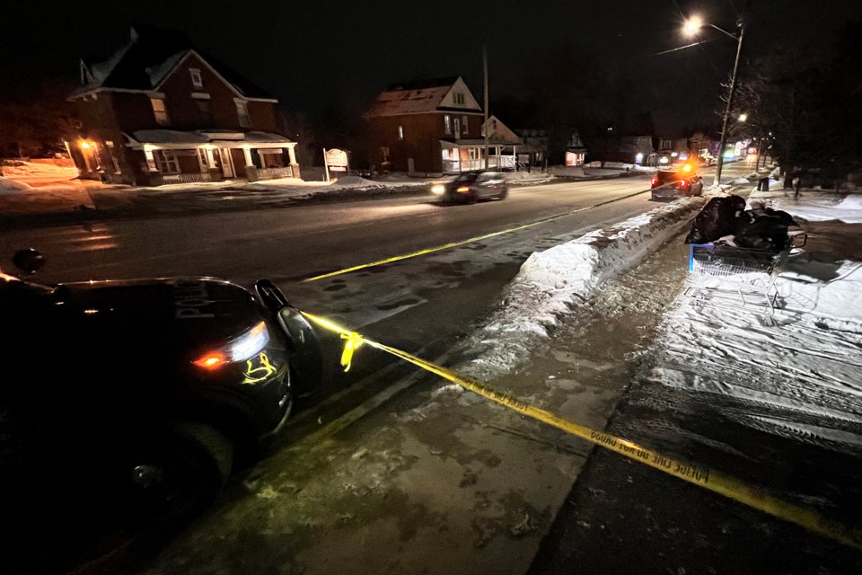 Barrie police investigate at Bayfield and Grove streets on Tuesday night following a double shooting.