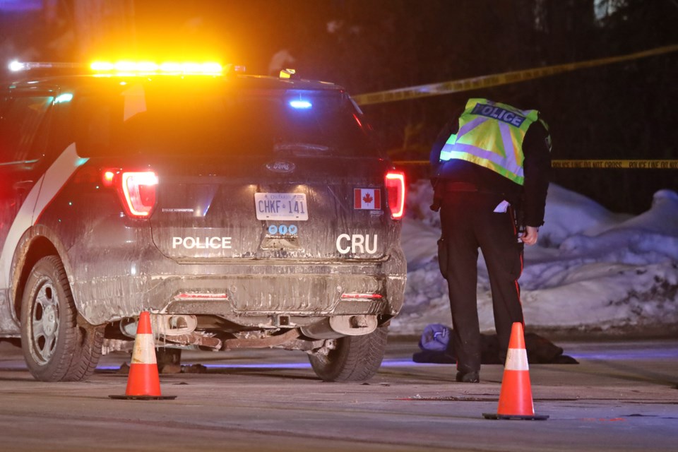 Barrie police investigate at Duckworth and Grove streets on Tuesday night.