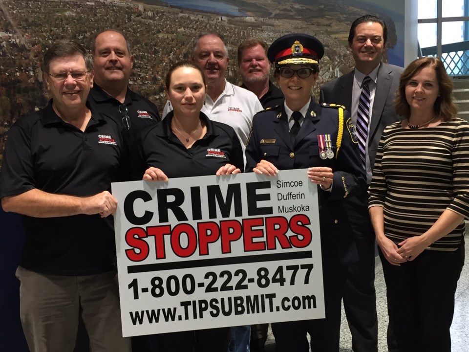 crime stoppers sign group