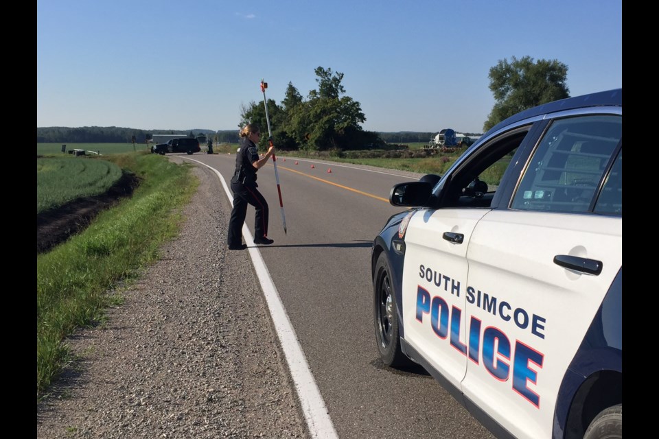 South Simcoe Police investigate a motorcycle crash into a ditch on 10th Sideroad north of Highway 89. Sue Sgambati/BarrieToday
