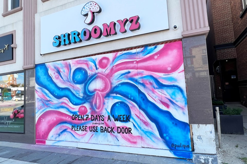 The boarded-up front of Shroomyz, a dispensary on Dunlop Street in Barrie.