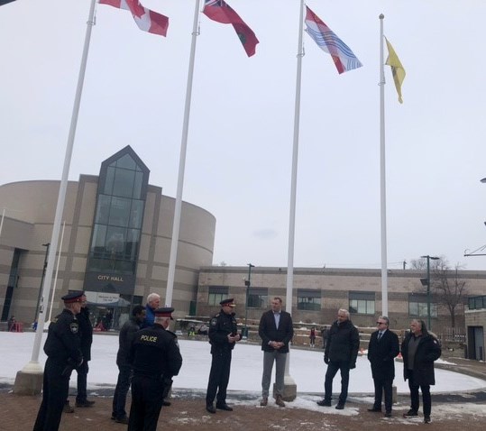 City and Barrie Police officials were on hand earlier today to lower the flags to half mast to honour Const. Grzegorz Pierzchala, who grew up in Barrie. The OPP officer was killed in the line of duty Tuesday. 