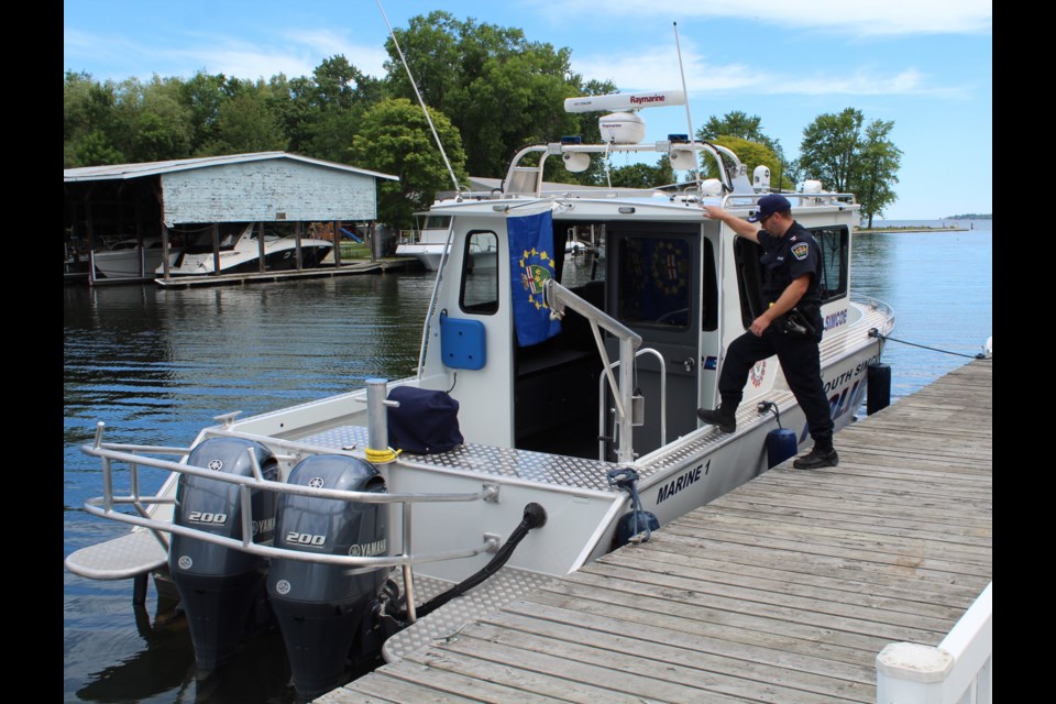 South Simcoe police Sgt. Dave Phillips steps aboard the new 32-foot John Graves Simcoe police boat in this file photo. Raymond Bowe/BarrieToday