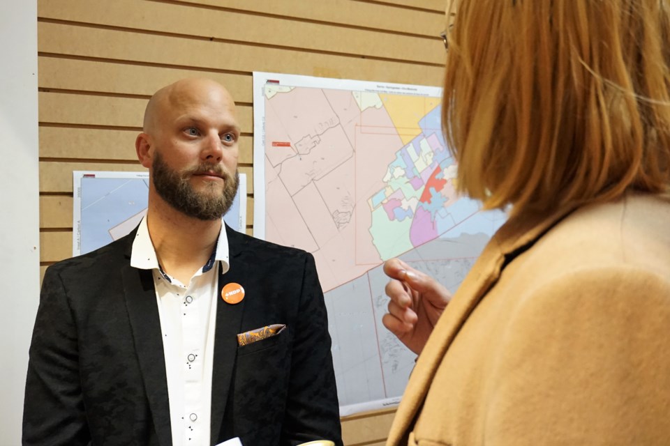 Barrie-Springwater-Oro-Medonte NDP candidate Dan Janssen chats with supporters on Monday night. Jessica Owen/BarrieToday