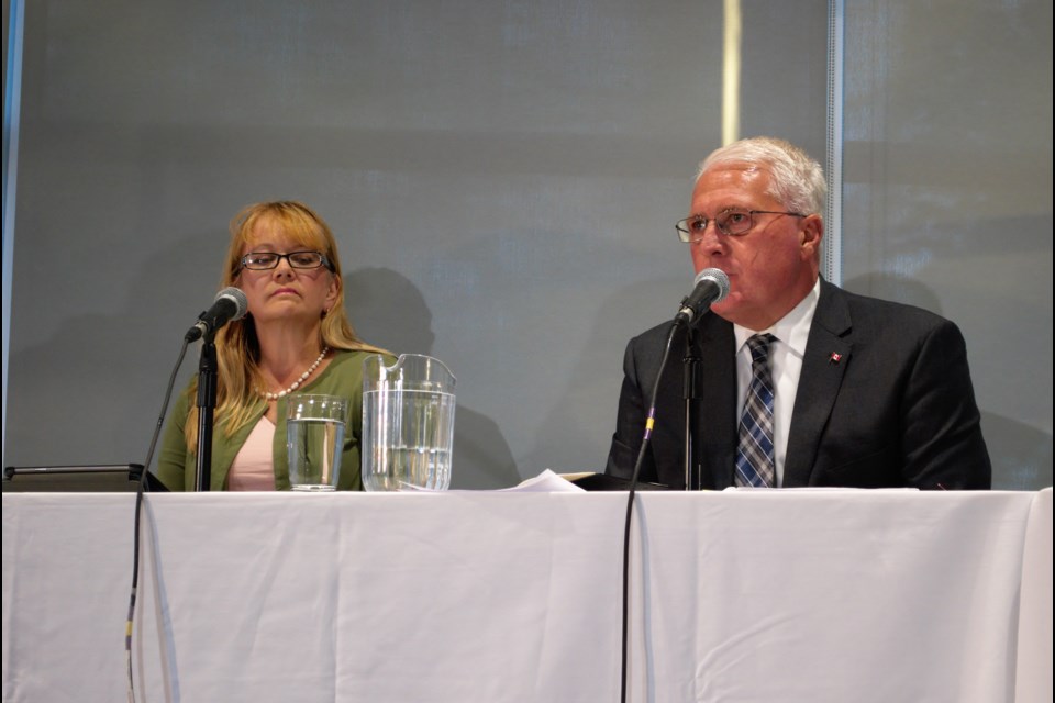 People's Party candidate Stephanie Robinson and Conservative candidate John Brassard are shown at the Barrie-Innisfil all-candidates debate on Oct. 8, 2019. Jessica Owen/BarrieToday