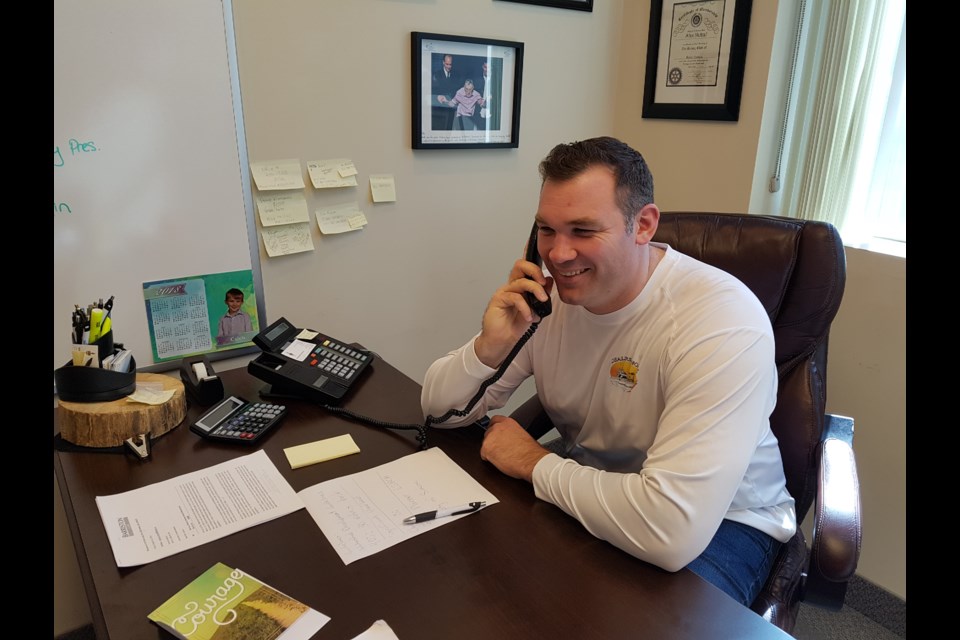 Barrie-Springwater-Oro-Medonte MP Alex Nuttall, who announced March 25, 2019 he will not seek re-election, takes time to answer calls at his constituency office in Barrie this morning. Shawn Gibson/BarrieToday