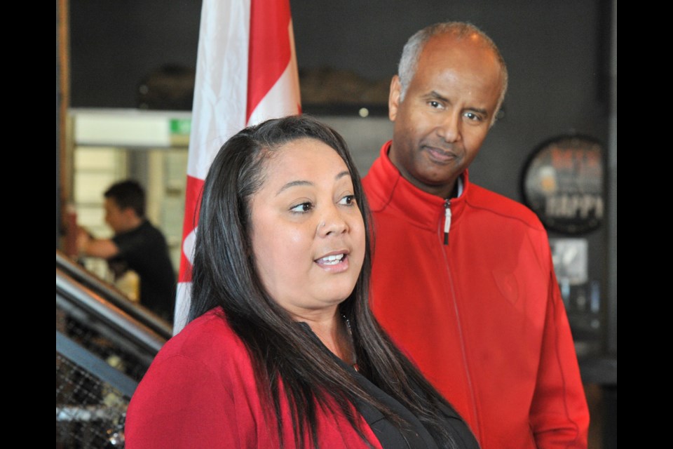 Liberal York South Weston MP Ahmed Hussen listens to Barrie-Innisfil candidate Lisa Marie Wilson while she addresses supporters during an event in Barrie on Saturday. Ian McInroy for BarrieToday