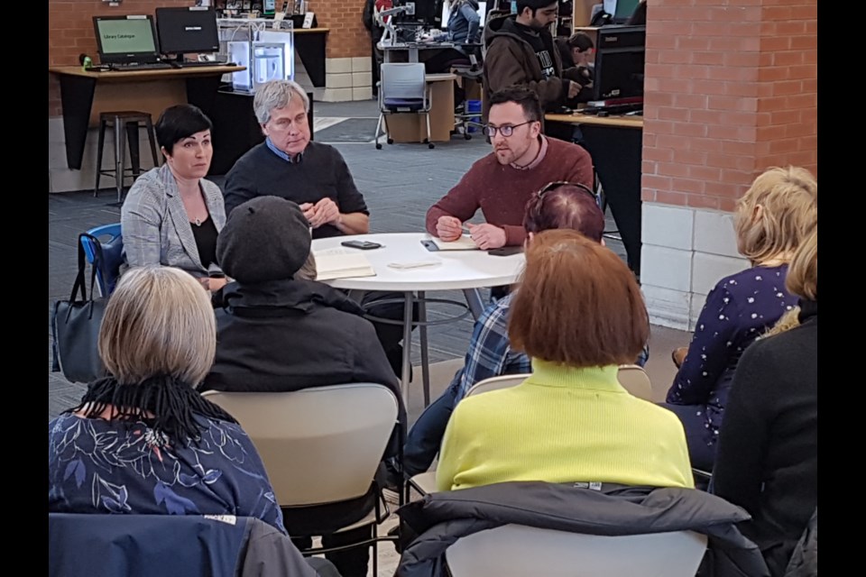 Barrie city councillors, from left, Natalie Harris, Barry Ward and Keenan Aylwin listen to residents at the downtown library. Shawn Gibson/BarrieToday
