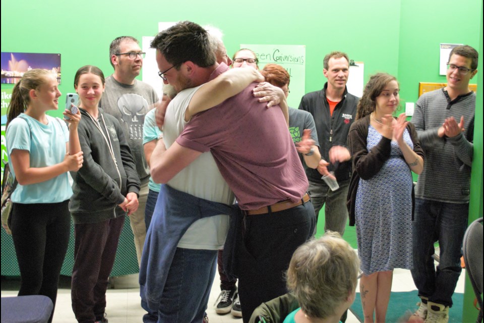 BSOM Green Party candidate Keenan Aylwin and Barrie-Innisfil Green candidate Bonnie North hug after Aylwin's concession speech. Jessica Owen/ BarrieToday