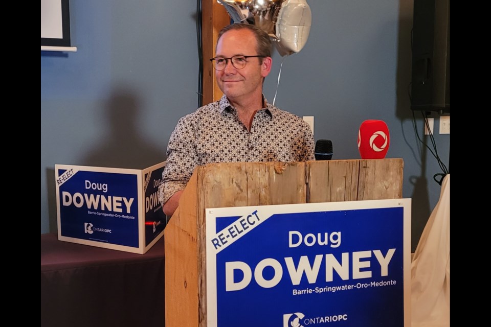 Doug Downey, the Progressive Conservative incumbent in Barrie-Springwater-Oro-Medonte, gives his victory speech in front of friends and supporters late Thursday night at Vespra Hills Golf Club. 