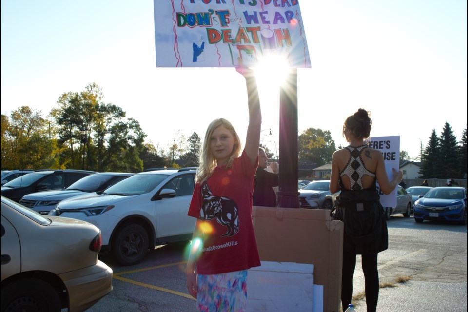 Sophia Hurd, 11, made her own sign for the animal rights protest, that said 'Fur is dead; don't wear death.' Jessica Owen/CollingwoodToday