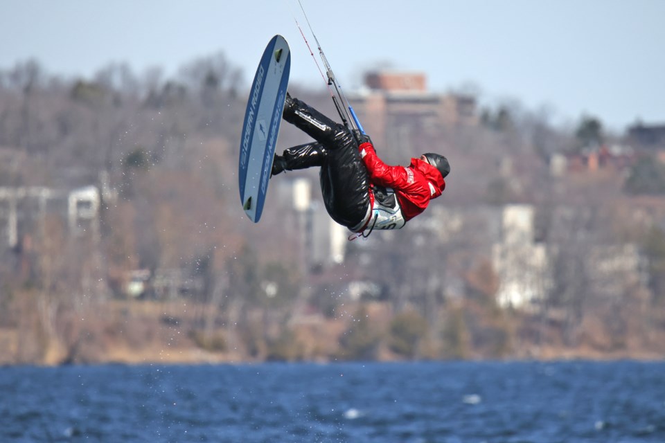 A kitesurfer gets some air as they descended onto Kempenfelt Bay in Barrie on Monday afternoon, soaking up the sun and riding the wind.