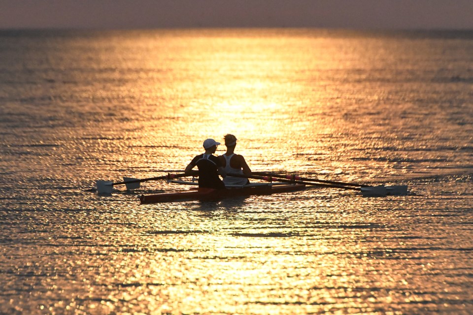 Barrie Rowing Club members Cheryl Arends and Sara Richardson enjoy a wonderful sunrise over Kempenfelt Bay earlier this week. Ian McInroy for BarrieToday