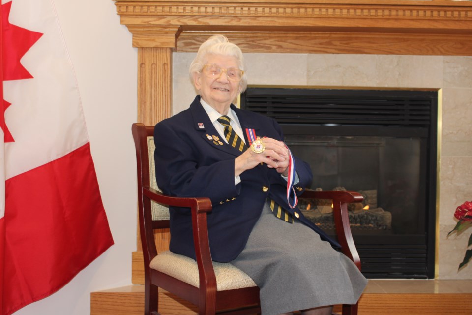 Canadian Air Force veteran Rita Stephenson, 98, poses with her VE Day medal. Photo submitted