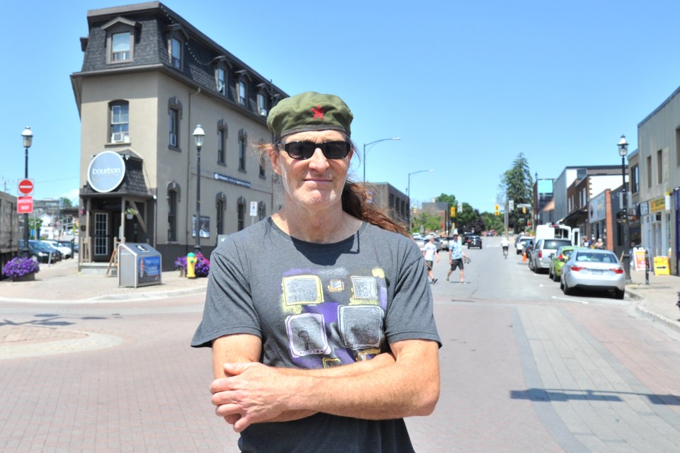 'Big' John Ritson, former owner of Big John's Records in downtown Barrie, stands at Five Points just steps away from the reincarnated version of the Clapperton Street shop he sold in 2005, now known as BJ's Classic Collectibles. Before delving into vinyl records, Ritson was an urban planner. Ian McInroy for BarrieToday