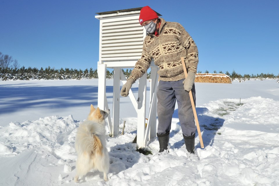 John Dunsmore, with his dog Gypsie, remembers past snowy winters that were longer and colder. Ian McInroy for BarrieToday