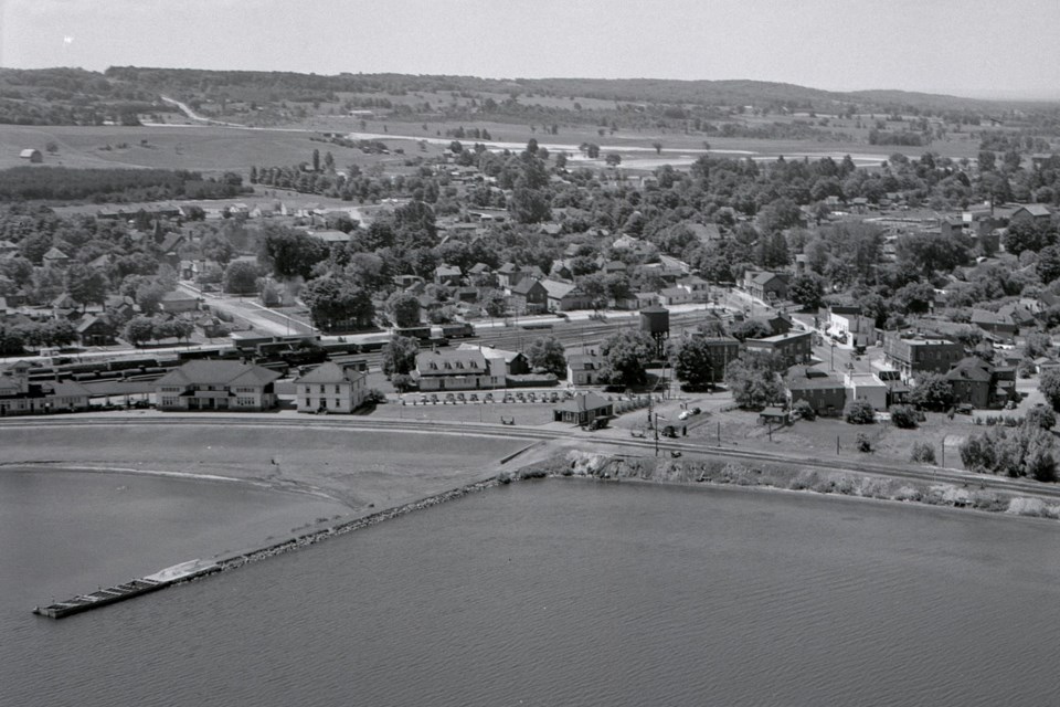 The Allandale train station and dock can be seen in this undated aerial photo looking to the west. The intersection of Bradford and Tiffin streets and Essa Road can be seen at right. Allandale, at left, was annexed from Innisfil in 1891.