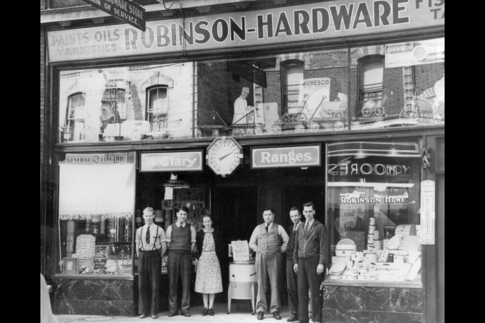 Alvin Robinson, second from left, at 31 Dunlop St. E.
