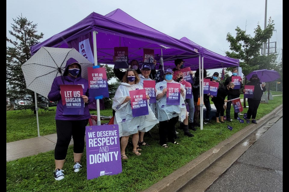 Despite the rain, front-line workers protested outside Royal Victoria Regional Health Centre in Barrie on Thursday. They were voicing their concerns over Bill 124 and what they say has been a lack of compensation.