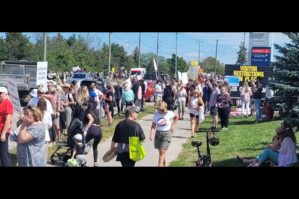 Protesters linee Georgian Drive near Royal Victoria Regional Health Centre (RVH) in Barrie on Wednesday. Rally organizers said it was against mandated vaccinations for health-care workers