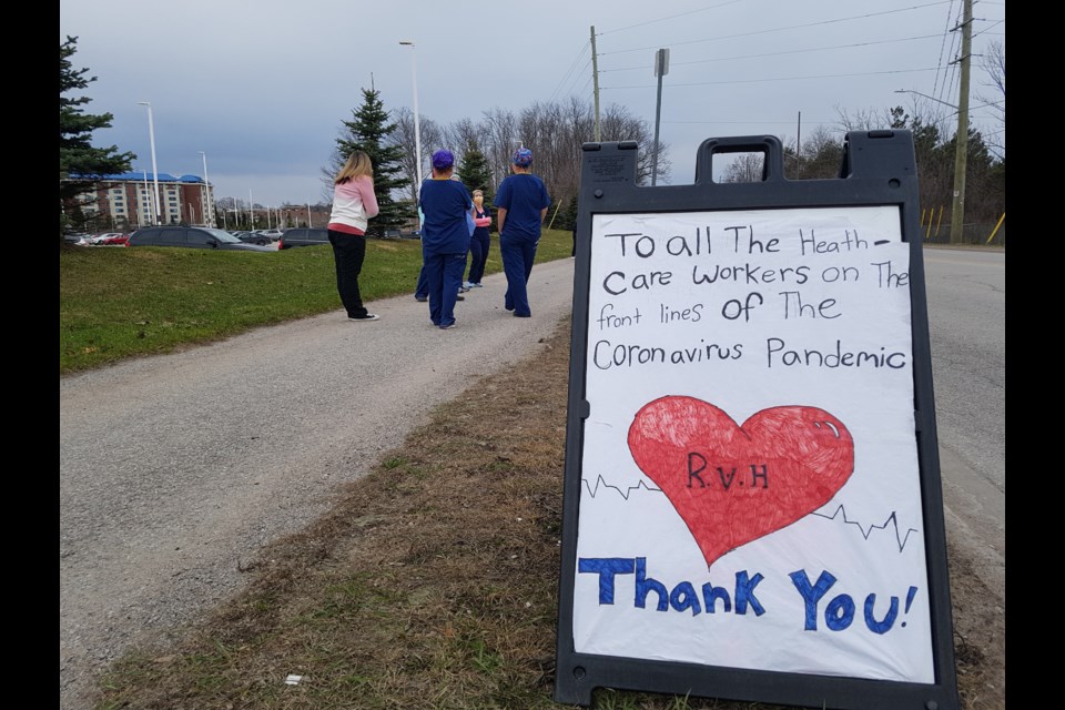 RVH staff wait for the parade of well-wishers to drive by on Monday, April 6, 2020. Shawn Gibson/BarrieToday