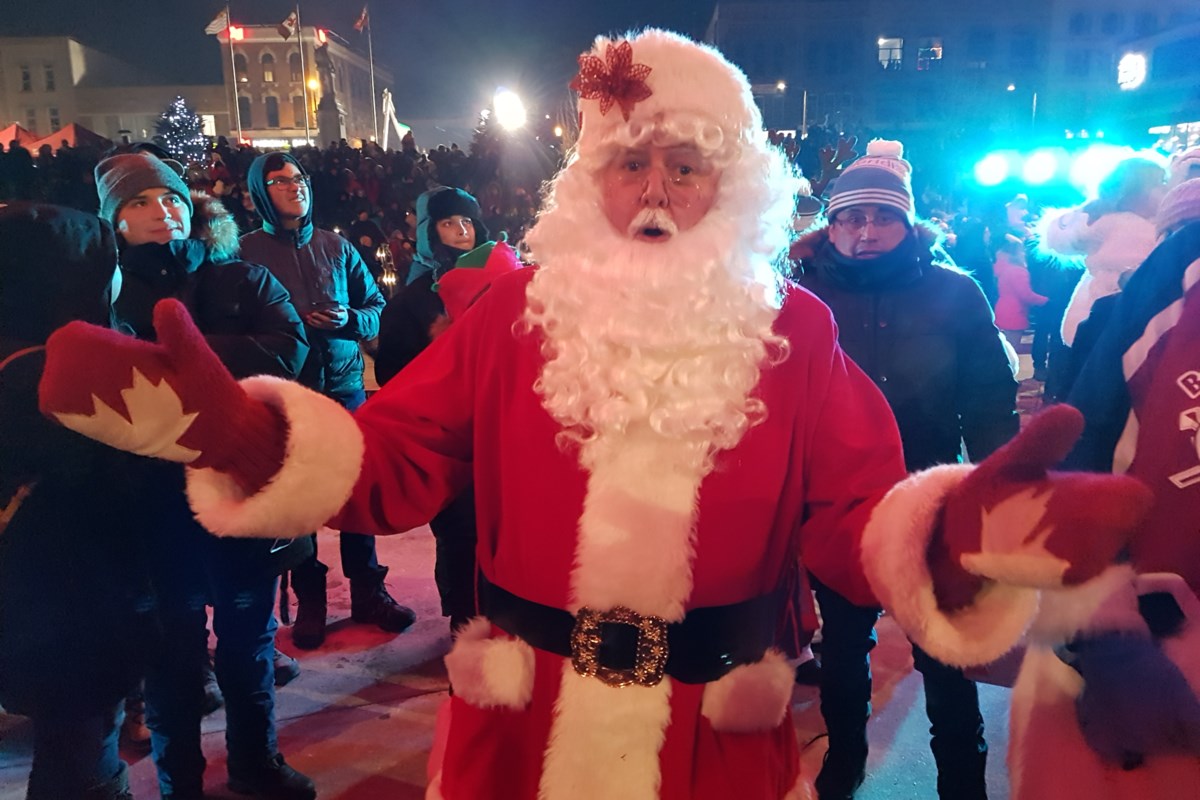 Santa Claus arrived and lit up the faces of thousands of paradegoers