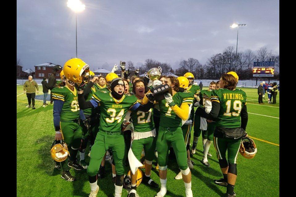 Glory level achieved as the Barrie North Vikings get their Simcoe County Athletic Association (SCAA) trophy, Thursday at J.C. Massie Field. Shawn Gibson/BarrieToday