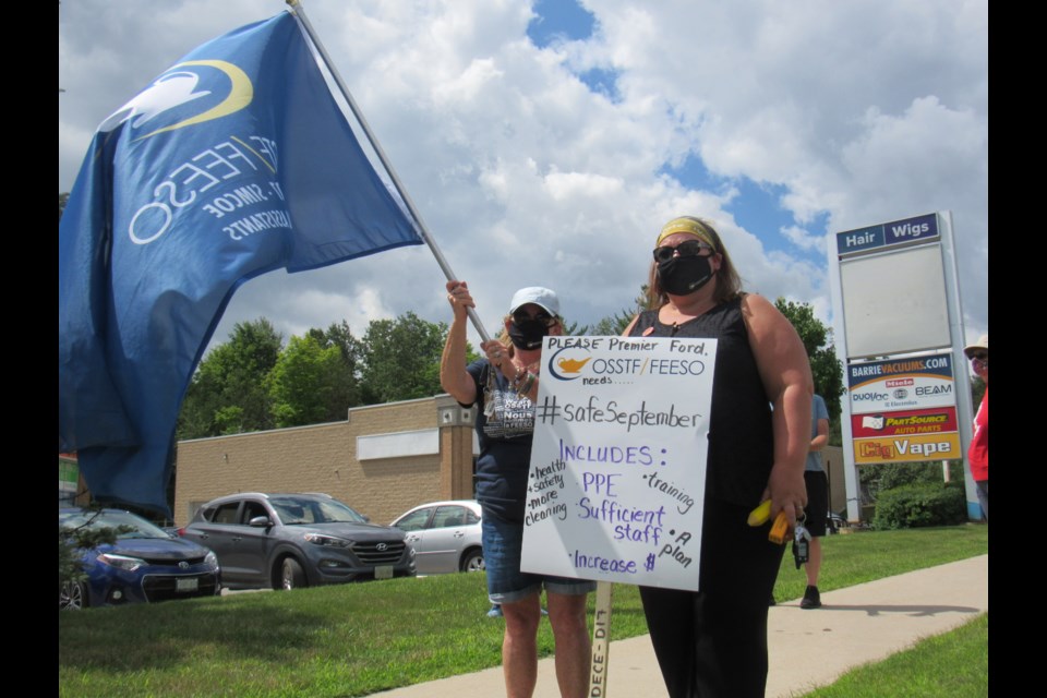 Deb Rowles (left) and Rita Golds-Nikolic were on hand for Wednesday's rally for a safe school reopening. Shawn Gibson/BarrieToday
