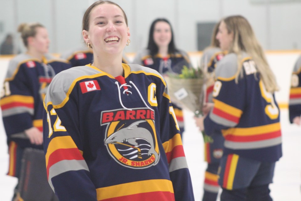 Barrie Sharks captain Eden Dusome is all smiles after the team's 4-3 win on  Saturday, March 18.