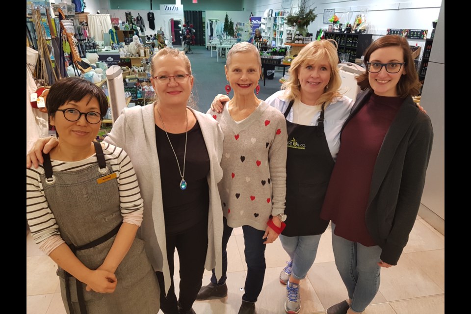 From left, Sunny Jung (Everleigh Garden), Judy Rickard (Janet Kemp), Tracey Baker (ZuZu), Kim Harrison (Barrie Olive Oil Co.) and Carly Saunders (Our House) all share space at the Shops of Downtown at Georgian Mall, Wednesday. Shawn Gibson/BarrieToday