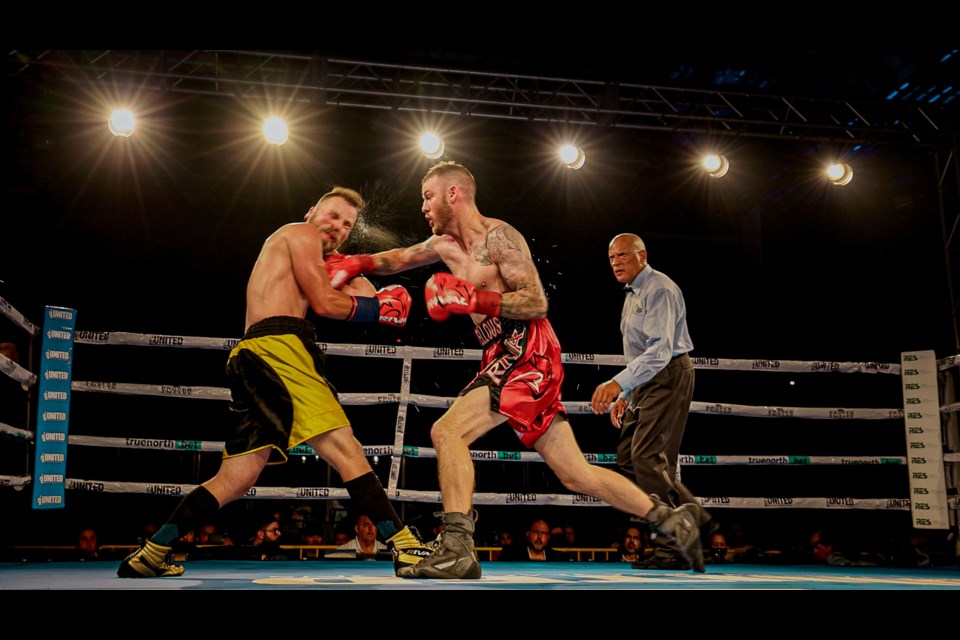 Barrie boxer Mark Smither successfully defended his Canadian Super Lightweight title recently at the East Bayfield Community Centre. 