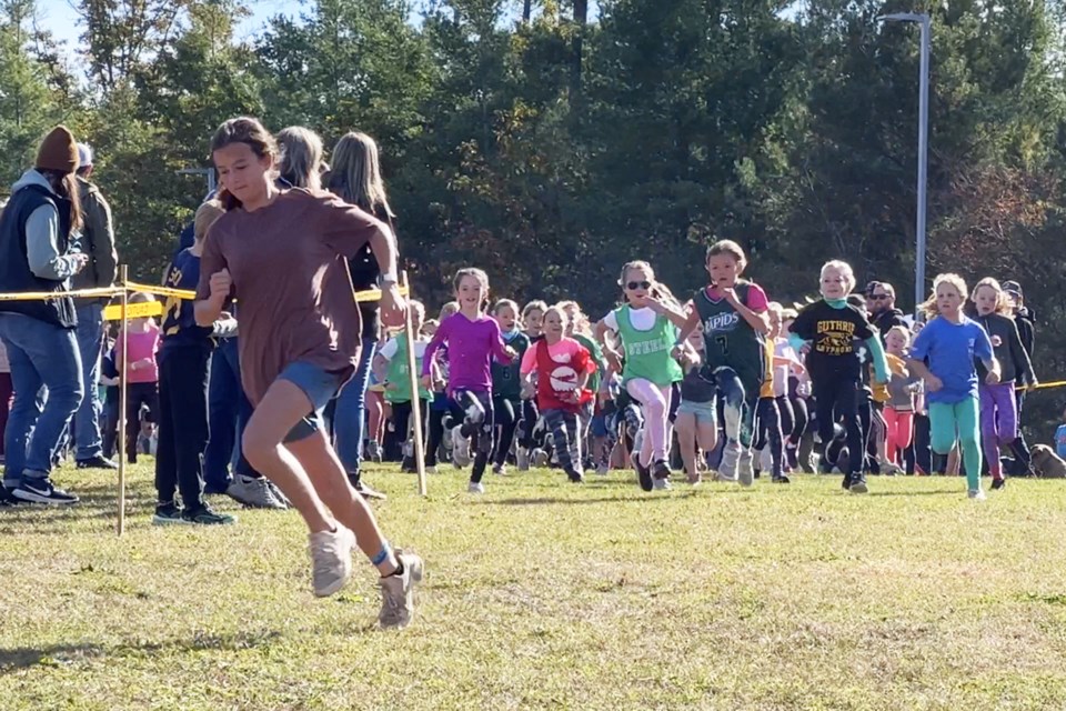 Students run through the race course, as the Simcoe County Elementary Athletic Council welcomed approximately 500 Simcoe County District School Board students to the Primary Fun Run at the Education Centre in Midhurst on Friday, Oct. 13, 2023.