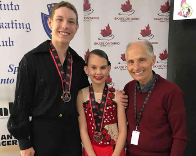 Former Olympian Don Jackson presents Dan Patriquin (Orillia Figure Skating Club) and Sophia Gover (Barrie Figure Skating Club) with silver medals.