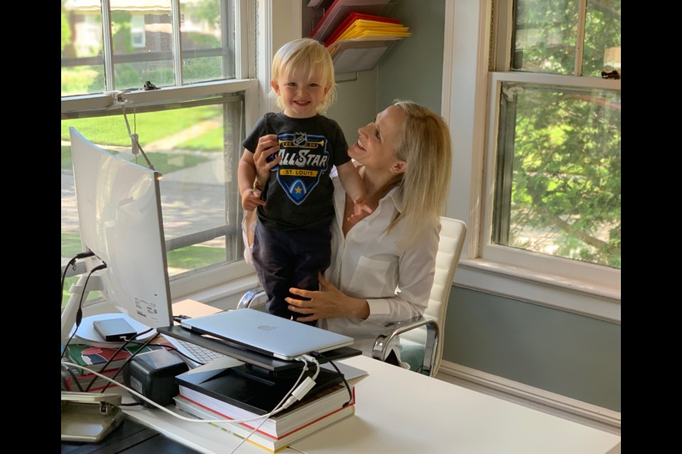 Jillian Frechette with her son, Luc, at home. 