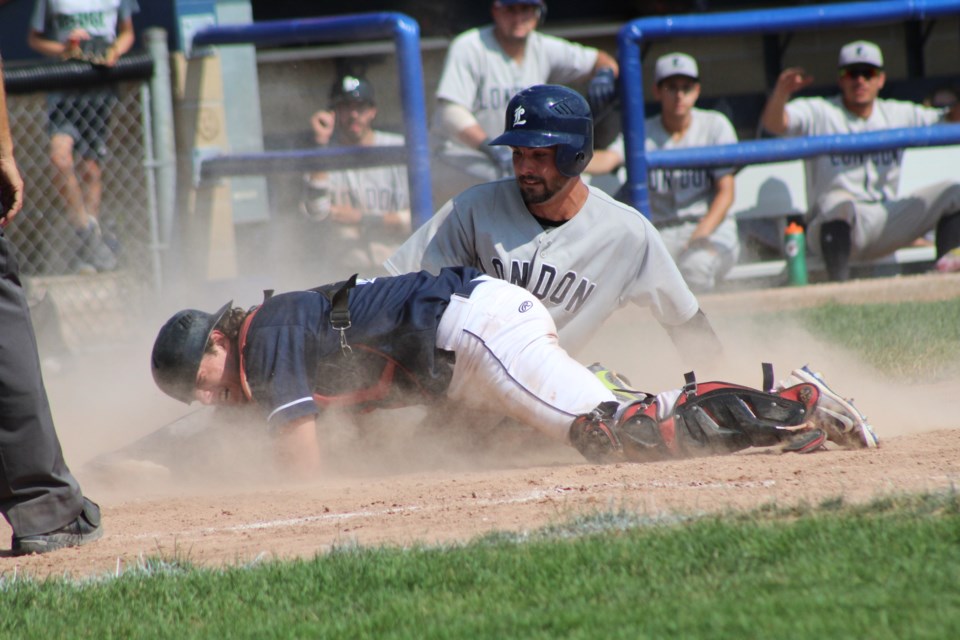 Barrie Baycats catcher Parker Walker tries to make a play at the plate against the London Majors, Sunday during Intercounty Baseball League action. The Majors went up 5-4 on the play, but Barrie stormed back with three runs in their half of the inning en route to a 7-6 win. Raymond Bowe/BarrieToday