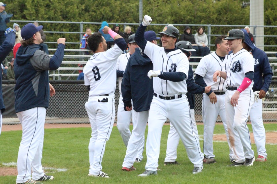 Jon Waltenbury celebrates with his Barrie Baycats teammates after cranking a grand slam during Intercounty Baseball League action May 12, 2019 at Coates Stadium. Raymond Bowe/BarrieToday